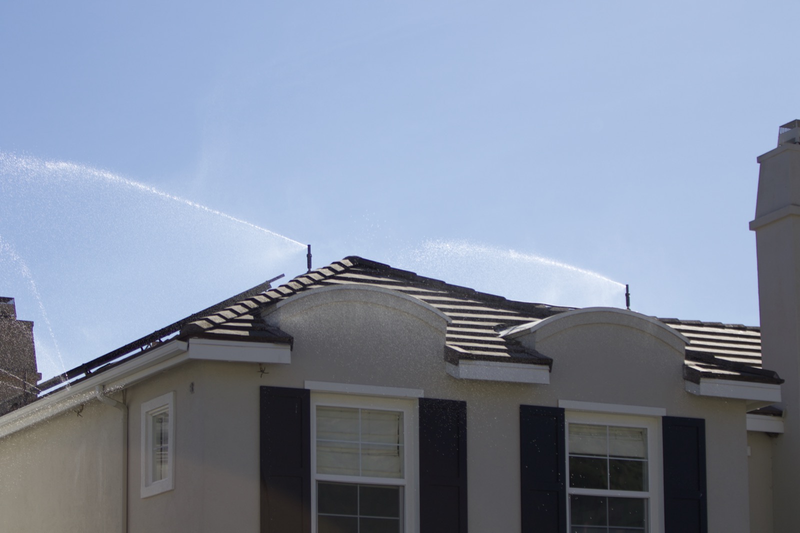 Activated Trident exterior sprinkler system in operation