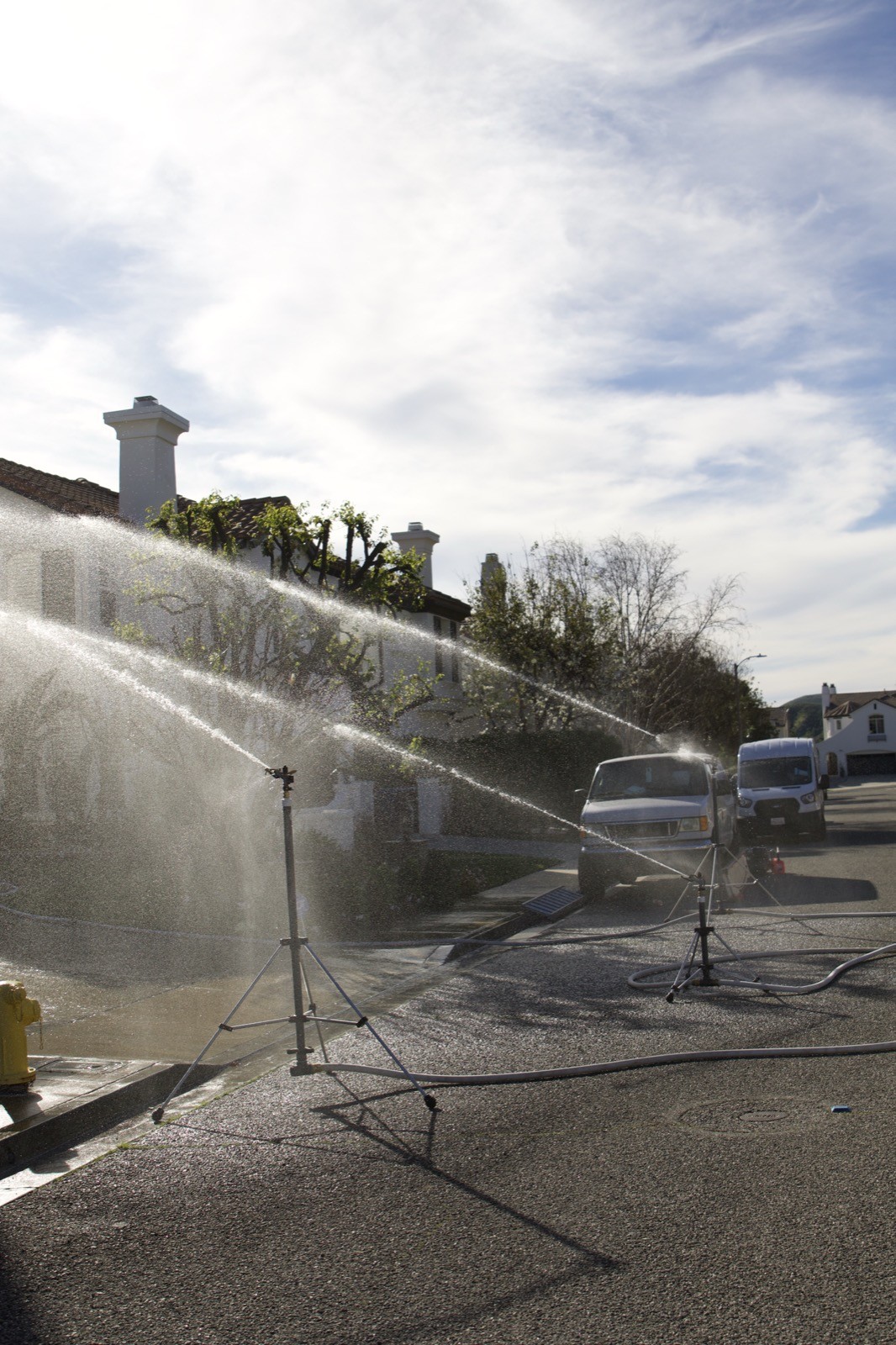 Attack tripod wildfire sprinklers lined up for deployment