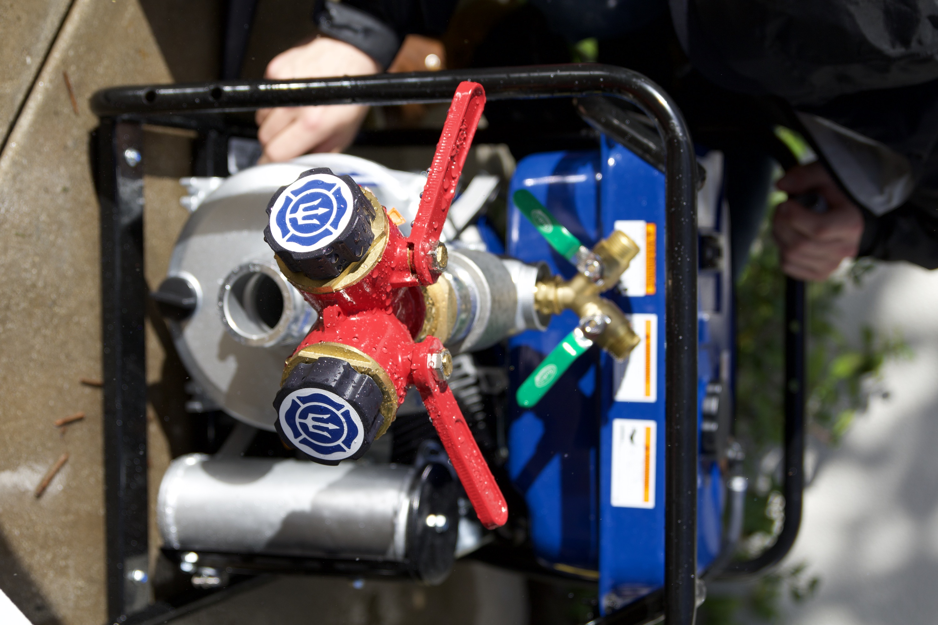 Portable pump system for wildfire sprinkler deployment